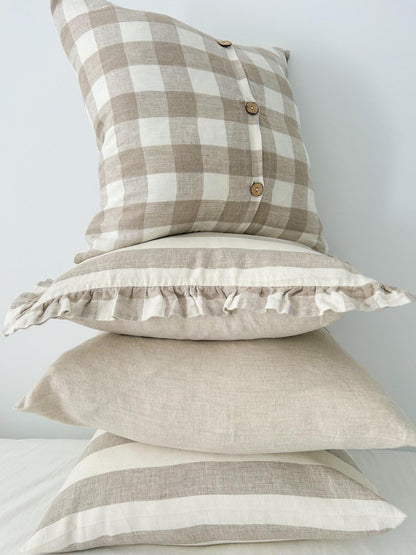 Natural Gingham linen cushion cover, Natural gingham cushion styles, Natural Gingham linen cushion with wooden buttons, Natural Gingham feature cushion, Affordable Natural Gingham cushions, Checked linen cushion covers, linen cushion trends, neutral linen cushion styles, neutral linen cushion covers, Natural Gingham bedroom cushions, Natural Gingham living room cushions